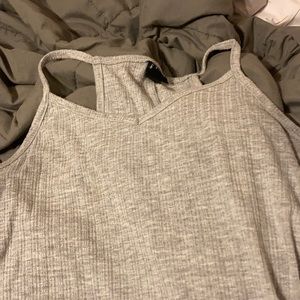 This grey flowy tank crop shirt